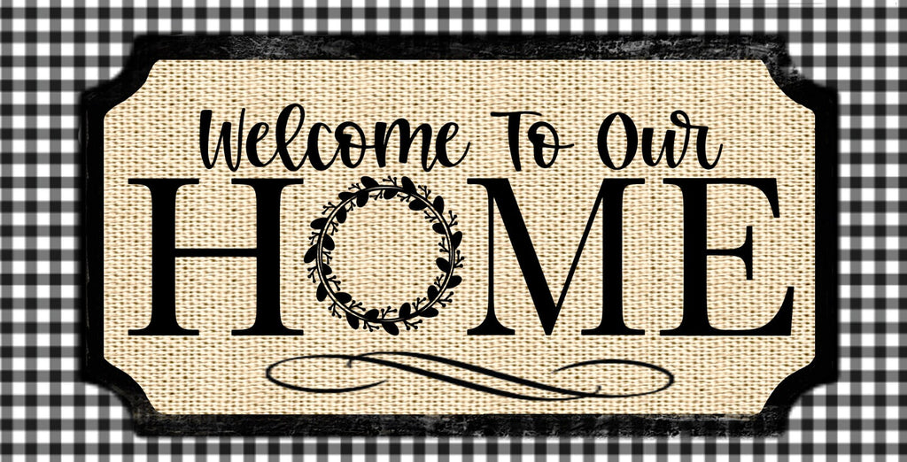 12 inch metal wreath sign with Welcome to our home printed in black atop a kahaki burlap background surrounded by a classic black and white gingham plaid print