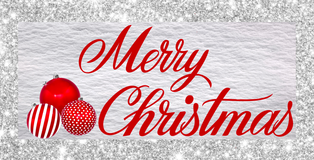 12 inch metal wreath sign features Merry Christmas written in red cursive set against a white snowy background and surrounded by a silver glitter pattern and accented with a trio of red ornament balls