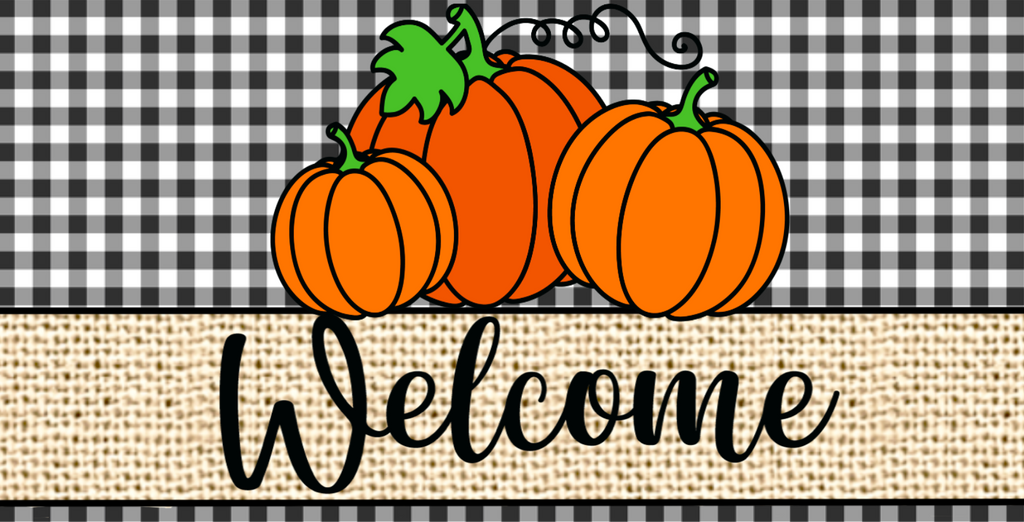 12 inch metal wreath sign with welcome printed in black atop a beige colored burlap background with a trio of pumpkins all set atop a classic black and white gingham plaid background.