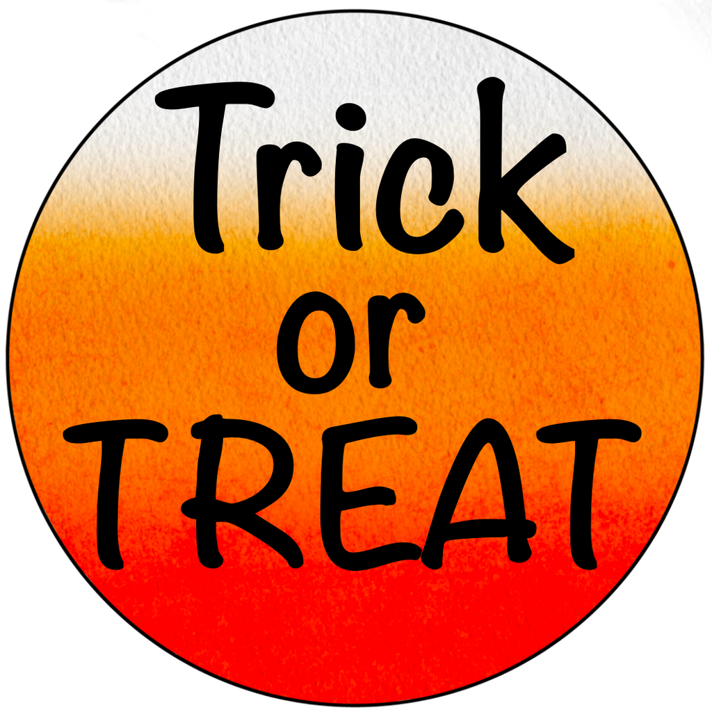 8 inch round wreath sign with Trick or Treat printed in black against a candy corn-colored background