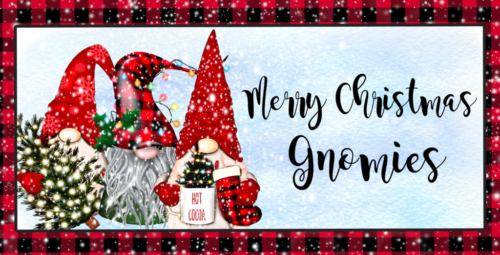 12 inch metal sign with a trio of Gnomes in red hats with the phrase Merry Christmas Gnomies written in black against a snowy background and surrounded by a classic black and red buffalo plaid print.