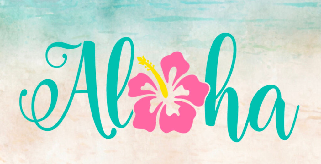 12 inch metal wreath sign with Aloha printed with a hibiscus flower replacing the "o" set against a watercolored beach background